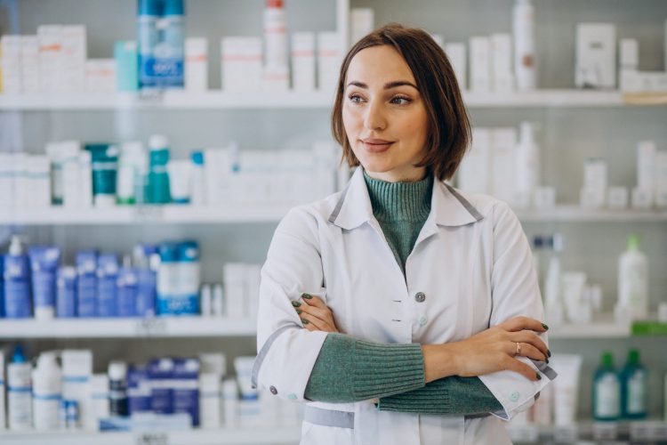 Young woman pharmacist at pharmacy